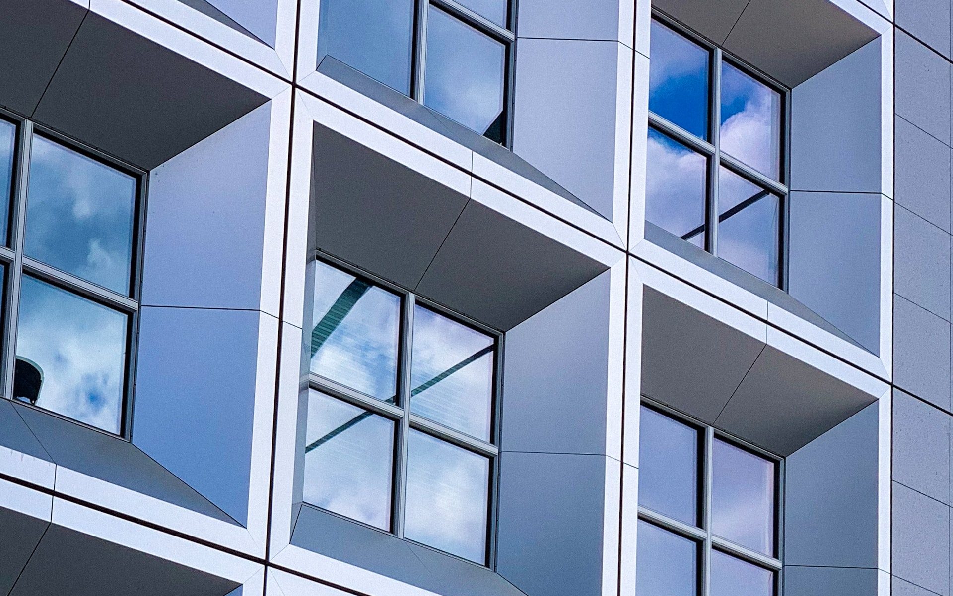 gray concrete framed glass building